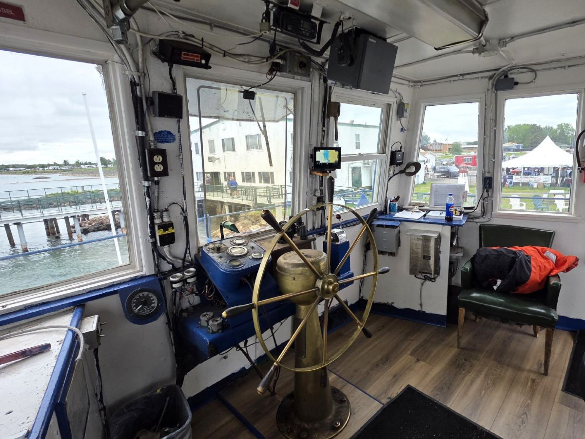 Inside the pilothouse of Soo Marine Supply Boat Ojibway docked at the Original Soo Locks Boat Tours maritime event Little Sailors Day Kids Ride Free here in Michigan's Upper Peninsula.