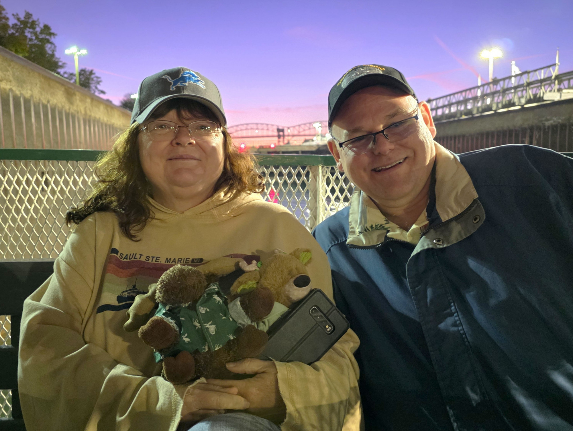 Family watching ships while passing through the Soo Locks during the Original Soo Locks Boatnerd themed cruise in Sault Ste. Marie, Michigan