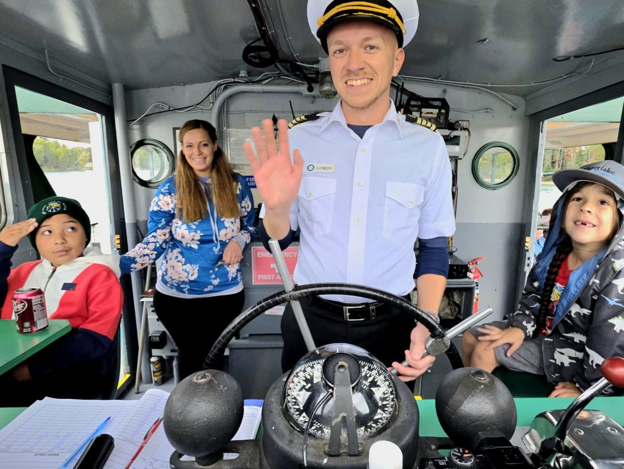 Captain Gordy of Original Soo Locks Boat Tours having fun with guests during a family‑friendly Boatnerd Cruises in Sault Ste. Marie, Michigan