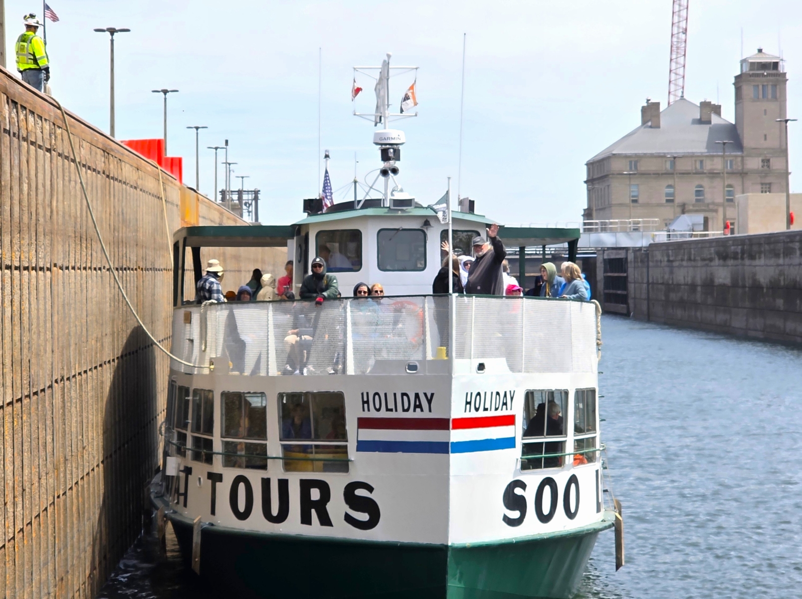 Soo Locks tour boat holiday inside the Poe Lock going up 21 feet to Lake Superior a family fun cruise in Michigan's Upper Peninsula