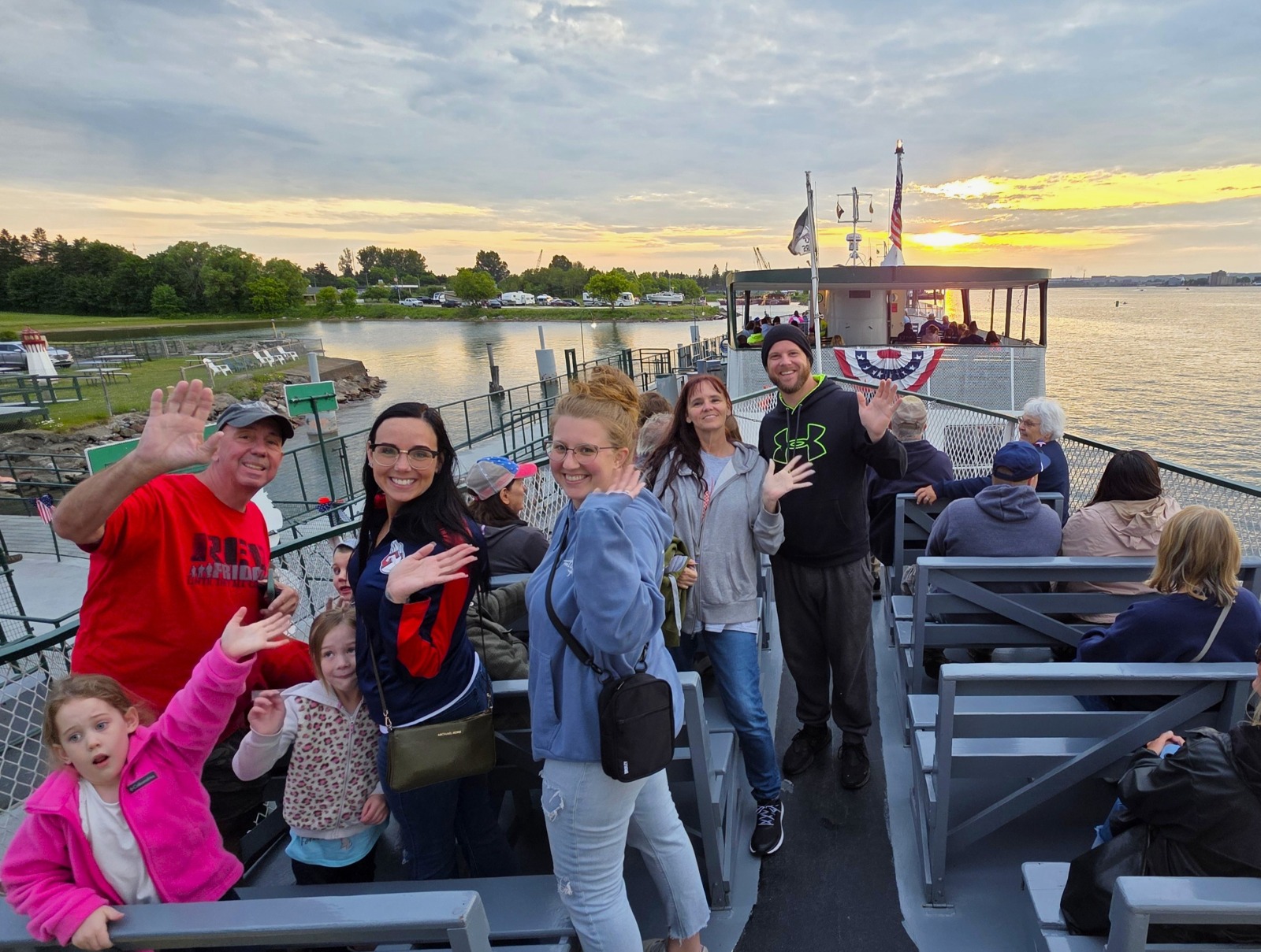 Guest gathering on deck of the Original Soo Locks Tours Boats preparing to depart for the fireworks cruise here in Sault Ste. Marie, Michigan.