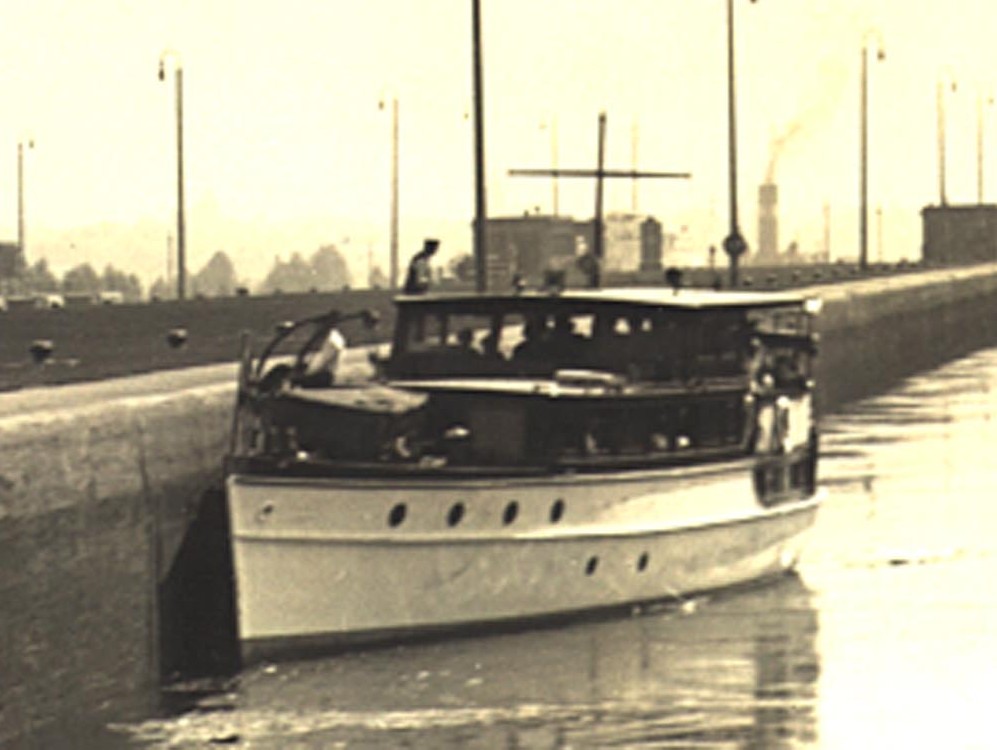 The first tour boat, Bide-A-Wee, of the Original Soo Locks Boat Tours inside the historic Soo Locks in Sault Ste. Marie, Michigan