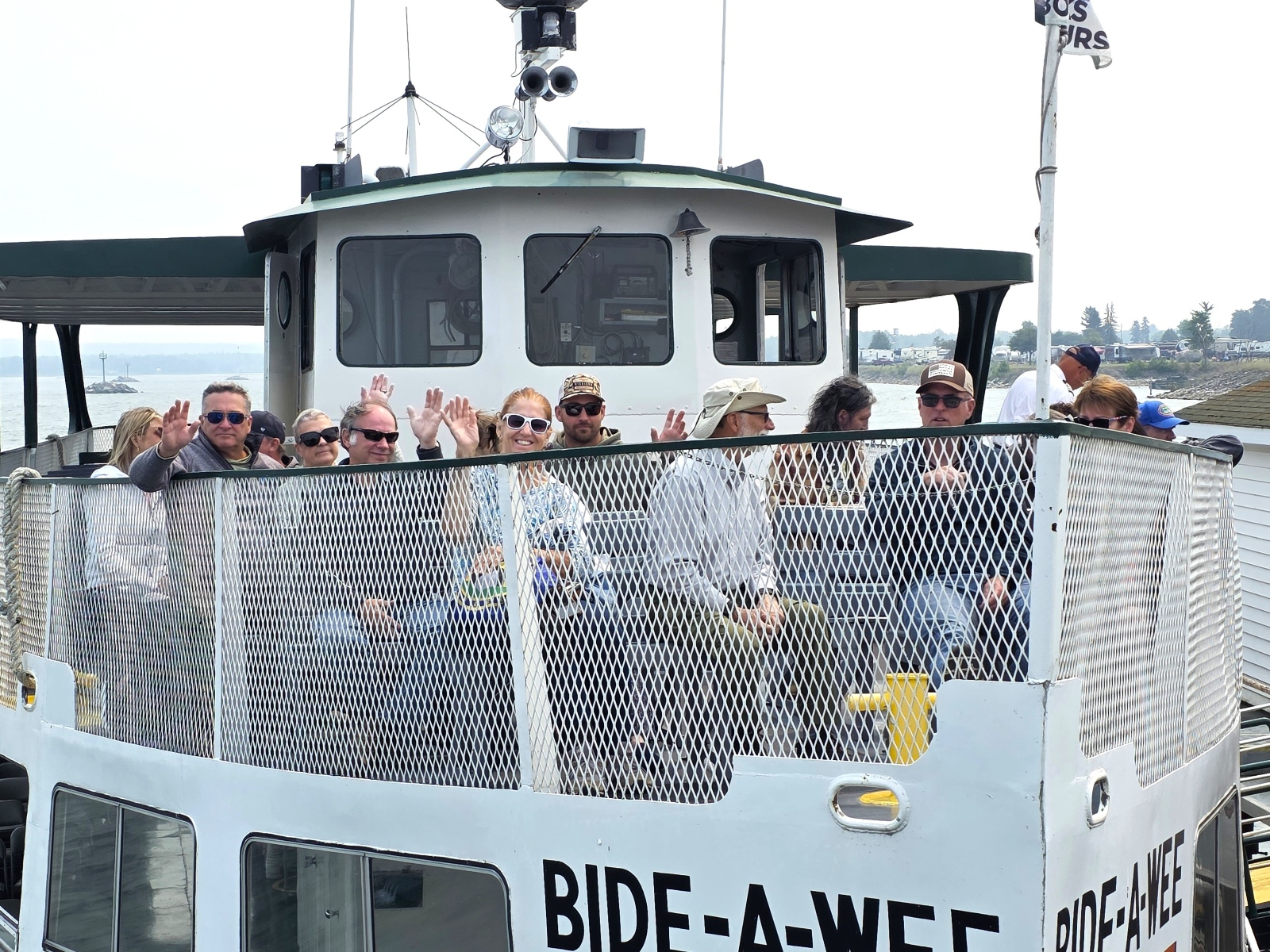 Guest on board the Original Soo Locks Tour Boat Bide-A-Wee Michigan's Upper Peninsula cruises in Sault Ste, Marie